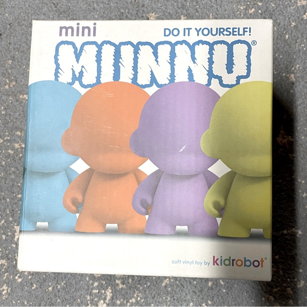Brand new in sealed box mini Munny.  Vinyl 4” color surprise.